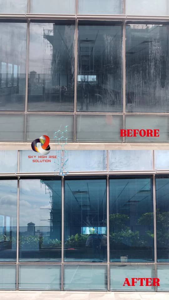 Sky High Rise team performing rope access facade cleaning on a high-rise building in Malaysia